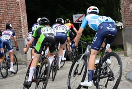Cyclists ride through Tervuren during the 2026 Grand Prix Vermarc road cycling race.