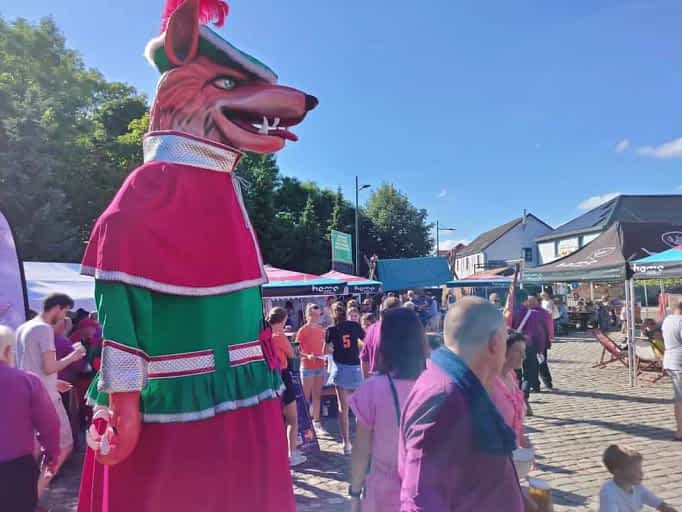 De Vos van Vossem giant in red and green at Vossem Festival, Belgium